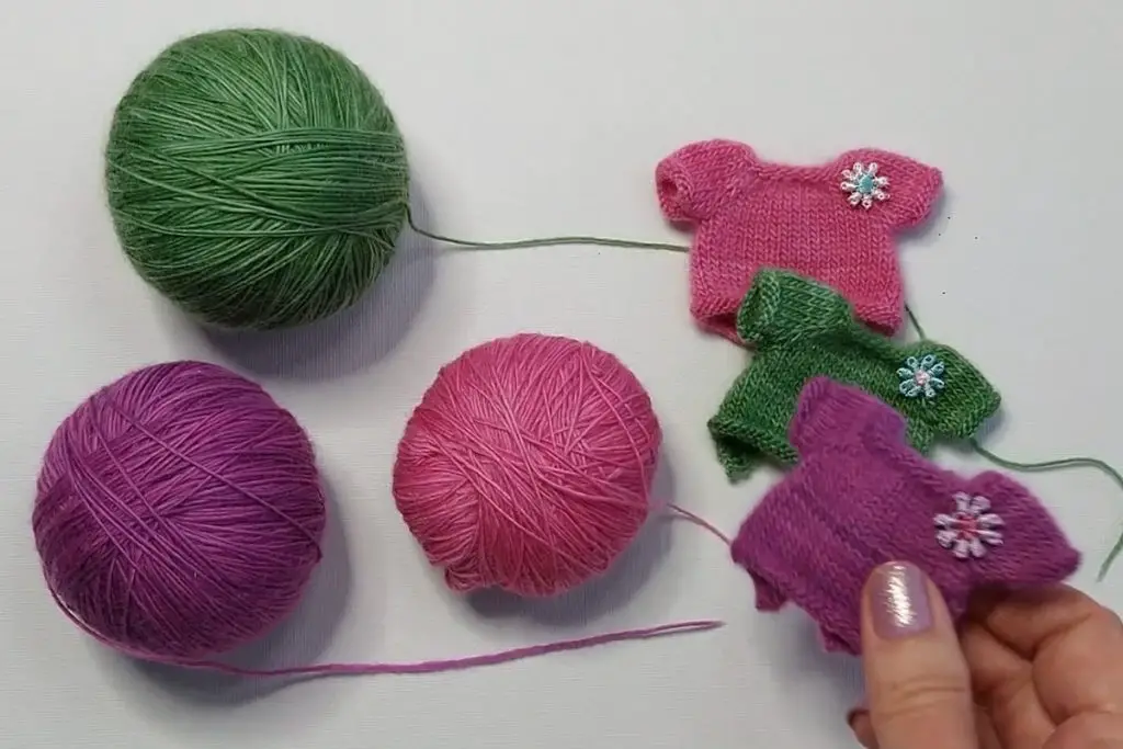 Miniature knitting using Malabrigo Lace yarn