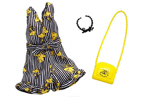 Barbie Fashion Pack Peanuts Snoopy Woodstock jumpsuit with black stripes, yellow bag, black necklace